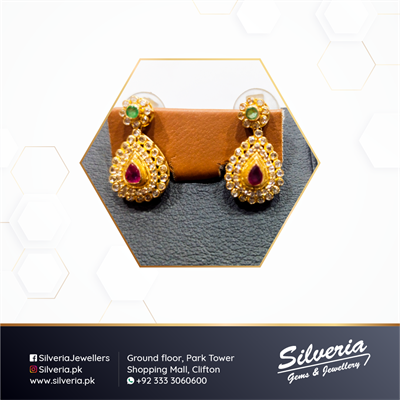 Tear Drop shaped natural Ruby and Emerald earrings in 21kt with diamond polki stones