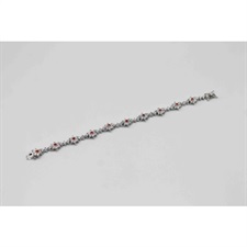 Beautiful bracelet with center flowered shaped orange zircon