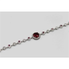 Beautiful bracelet with round shaped red and white zircon