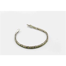 Tennis bracelet with square and round shaped green zircon