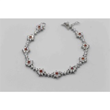 Beautiful bracelet with center flowered shaped orange zircon