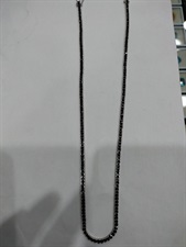 Tennis necklaces with princess cut stones in white and black zircons