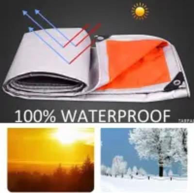 PLASTIC TARPAL (ORANGE/SILVER)100% WATERPROOF.USED FOR SUNSHADE AND OTHER OUTDOOR ACTIVITIES.