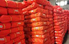 PLASTIC TARPAL (ORANGE/SILVER)100% WATERPROOF.USED FOR SUNSHADE AND OTHER OUTDOOR ACTIVITIES.