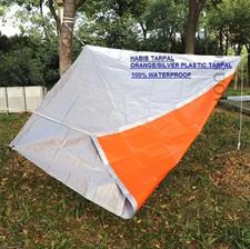 PLASTIC TARPAL (ORANGE/SILVER)100% WATERPROOF.USED FOR SUNSHADE AND OTHER OUTDOOR ACTIVITIES.
