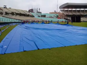 Heavy-Duty Waterproof Plastic Tarpaulin for Cricket Pitch Cover | UV Resistant Ground Sheet with Reinforced Ropes,All-Weather Cricket Pitch Protection Tarpaulin – Durable Poly Tarp Cover for Practice Nets and Stadiums.