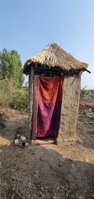 Three Houses and One Bathroom for Three Families