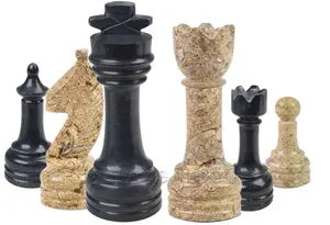 Handcrafted Jet Black and Coral Fossil Marble Chess Set | Luxury Polished Stone Chess Pieces for Strategy Enthusiasts