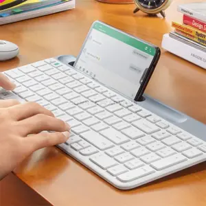 Logitech K580 Slim Multi-Device Wireless Keyboard with Numeric Keypad, Easy-Switch Technology, Bluetooth & Logitech Unifying Receiver, Integrated Phone Cradle, Whisper-Quiet Low-Profile Keys for Windows, macOS, ChromeOS, iPadOS, iOS & Android