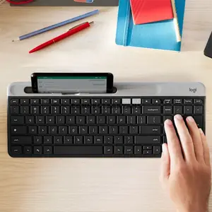 Logitech K580 Slim Multi-Device Wireless Keyboard with Numeric Keypad, Easy-Switch Technology, Bluetooth & Logitech Unifying Receiver, Integrated Phone Cradle, Whisper-Quiet Low-Profile Keys for Windows, macOS, ChromeOS, iPadOS, iOS & Android